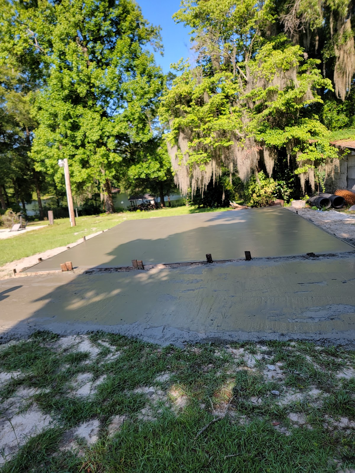 Large outdoor backyard patio slab under construction
