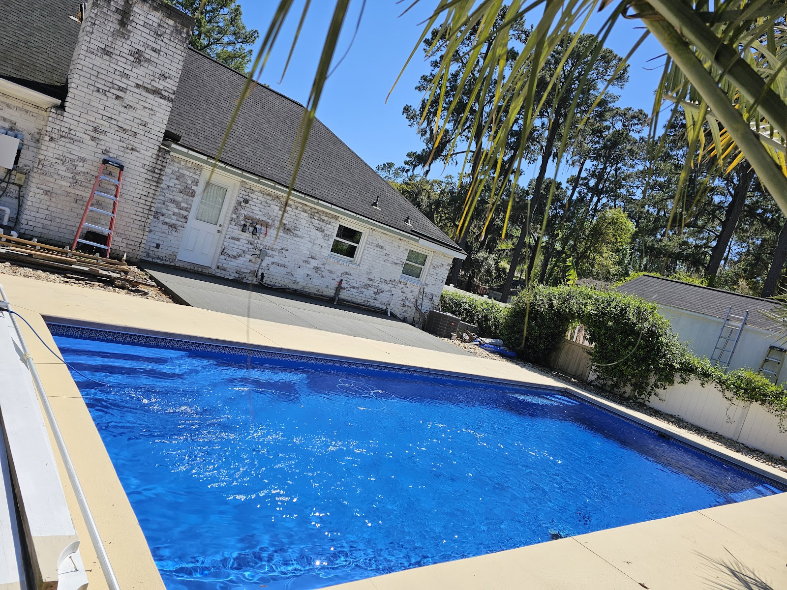 Backyard pool deck concrete work